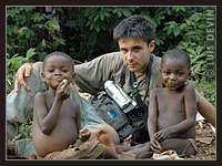 Luis Devin with Baka Pygmies in the rainforest of Cameroon