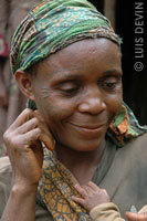 Pygmy woman with facial scarifications and a scarf