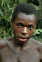 Pygmy boy in a rain forest camp