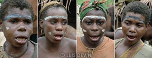 Pygmy women with painted faces for a ritual ceremony